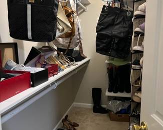 Entire closet dedicated to shoes (many never or barely worn), bags, and even a few wigs!
