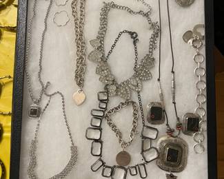Some sterling silver items. Yes! That is a Tiffany classic tag bracelet in the middle.