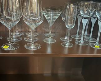 Stolzle Lausitz wine glasses - set of 6. Mikasa sea mist white frosted tulip wine glasses - set of 4. Other various glassware.