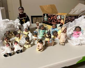 Collection of African American figurines and Christmas ornaments
