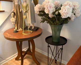 Santos Cage dolls
Swivel top wooden table