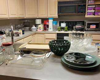 Kitchenware, serving dishes, coffee cups, iced tea maker, ice crusher, plates, bowls, white dinner service for 12. Salt and pepper shakers, toaster overn and more!