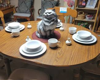 White dish set. Many places settings. Will separate. 
Cute little white bud vases.
Persian ceramic cat.