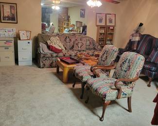 Arm chairs, queen size sofa sleeper, filing cabinets, end table, coffee tabel, shelves, ceramic persian cat, vase, photo storage boxes,