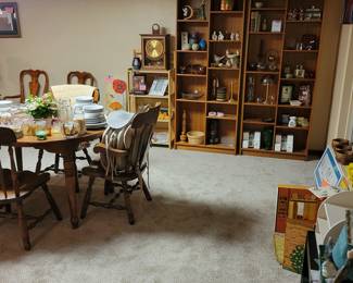Dining Room Table, Shelving, Partylite Candle Collection, Candle holders, Soapstone Dragon, Hummel Ornaments (2), Mantle Clock, Lamps, Sofa, Arm Chairs, End Tables