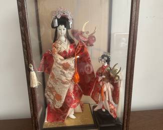 Asian dolls and doll case