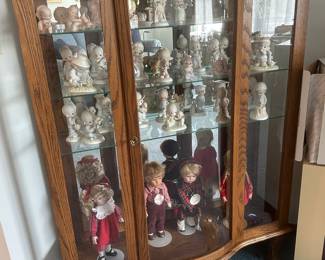Curio cabinet, dolls and Precious Moments