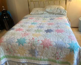Brass full size brass headboard and quilt