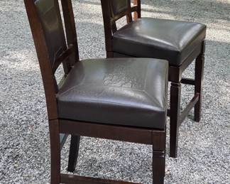 Two Leather Swivel Barstools