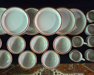Collection of dinnerware from the Boulder Ridge pattern by Noritake.