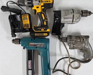Assorted drills, including vintage and cordless.