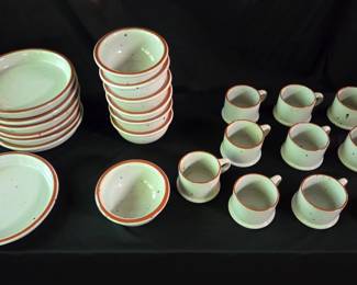 Collection of dinnerware from the Boulder Ridge pattern by Noritake.