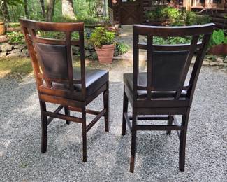 Two Leather Swivel Barstools