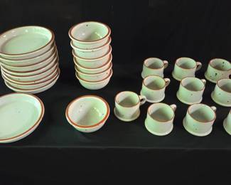 Collection of dinnerware from the Boulder Ridge pattern by Noritake.