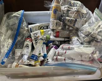 collection of artists' paints in tubes and bottles