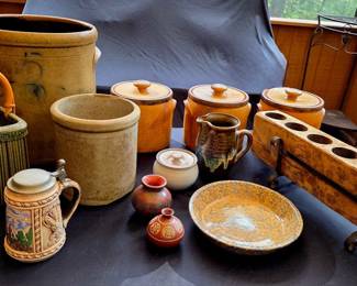 Collectible crockery, sugar mold, and canisters.