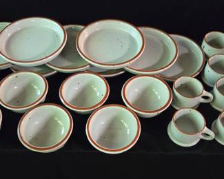 Collection of dinnerware from the Boulder Ridge pattern by Noritake.