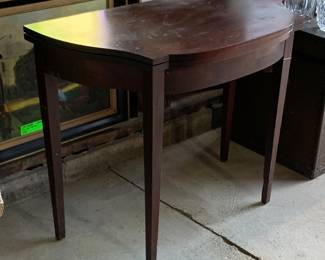 Gaming table. Top folds over and rotates for gaming.