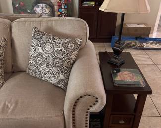 Traditional end tables and 3 cushion neutral color sofa, lamps, pillows