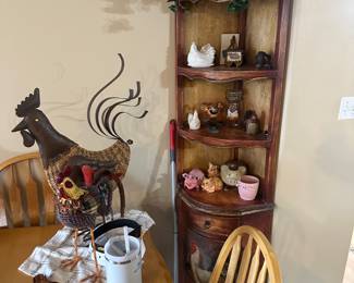Corner cabinet with pigs and roosters 