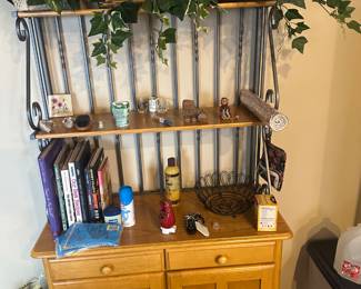 Bakers rack, silk plants, books, 