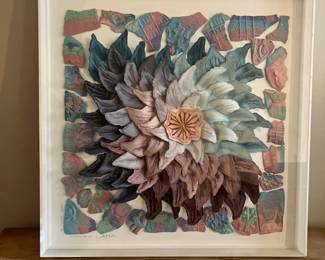 $4,500 - Barbara Brozik (American, Atlanta, GA, 20th century), "Winter Bloom" - 1986, mixed media collage, signed and dated in graphite to lower left. The pristine piece is comprised of torn and shaped paper and broken pottery, each piece with a deckled edge, watercolor painted with center of applied gold foil, encased in plexiglass. Framed approximately 36", width 36", depth 3-4".