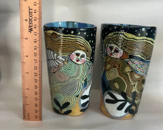 $1,600 - Pair of original Jane Peiser pieces.  Jane Peiser is known for multi-colored porcelain hand build forms including small sculptures. She used this process to create intricate patterns and subtle color gradations. This process results in unique pieces of visually complex integral patterns.  Often pattern gives way to representational scenes filled with flowers and animals. She uses relief pieces of either solid colored clay or patterns to add another dimension to her work.  Most of her work is salt glazed. “I’m looking back on 75 years of life on this amazing earth, 45 years in which it has been my great privilege to earn a living making pottery. 