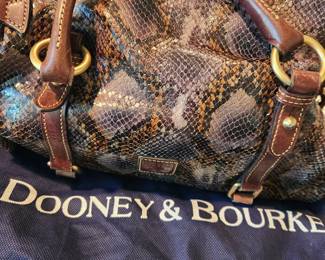 Dooney and Bourke purse and protective bag. 