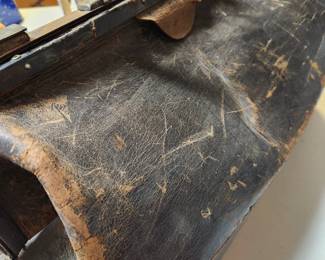 Looks like an Antique Doctor's Bag. 