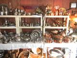 Pewter and copper items, baskets under the table