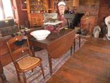 drop leaf table, caned seat chairs, Toledo scale