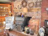 wood burning stove and corner cupboard are NOT for sale. Crocks, coffee bin, grates, Wagner iron pot, chair, etc. are!