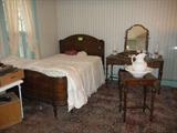 half of 6 pc bedroom set... full bed, vanity with mirror/bench, night stand...
