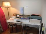 fabric, lamp, sewing machine drawers, ironing board