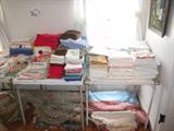 sheets and towels, throw rugs under the table