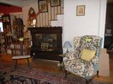 MOP inlaid rocker, interesting top to a buffet (no base), crewel upholstery wing chair, tile top side table