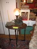 oval, folding tilt top table with spelter lamp