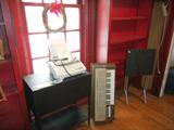 rolling lateral file, keyboard, projector stand, fax machine