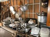 extra kitchenware, pots, pans