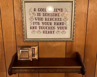 Living room - shelf above sofa & cross-stitch framed picture