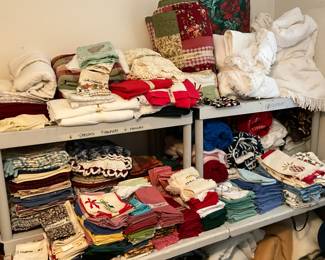 3rd bedroom - This table contains sets of napkins, sets if place mats, tablecloths, and bedspreads