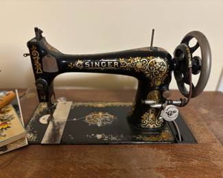 Early 1900s Singer Hand Crank Sewing Machine and Cabinet
