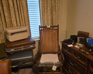 Variety of Luggage. Chair, dresser