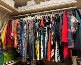 Tons of ladies clothes. Size XS-Med all of them petite