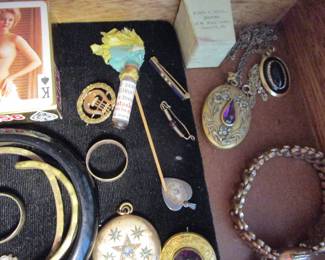 Vintage advertising on stick, sweetheart bracelet, lockets, more