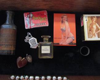 Nudies, perfume, advertising bottle