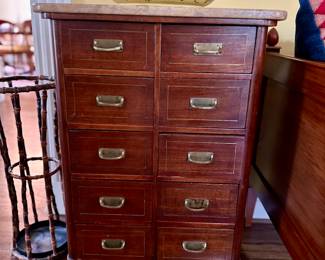 Antique marble topped filing cabinet with brass pulls