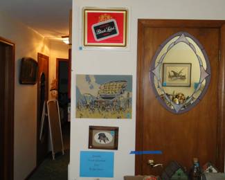 Beer memorabilia, cross stitch, and lots and lots of jewelry