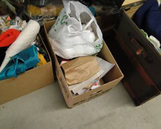 Boxes of fabric. And just remember, everything is 50% off, which makes fill a bag of fabric, only $4