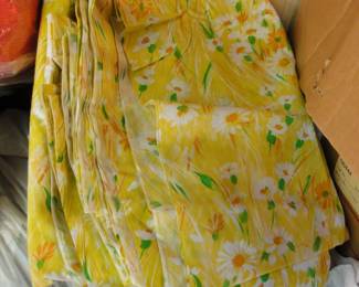 Fun floral yellow fabric, and we have plenty of fabric